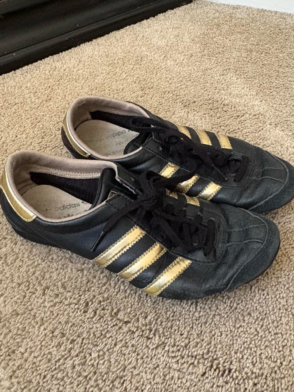 adidas Black Sneakers with Gold Stripes